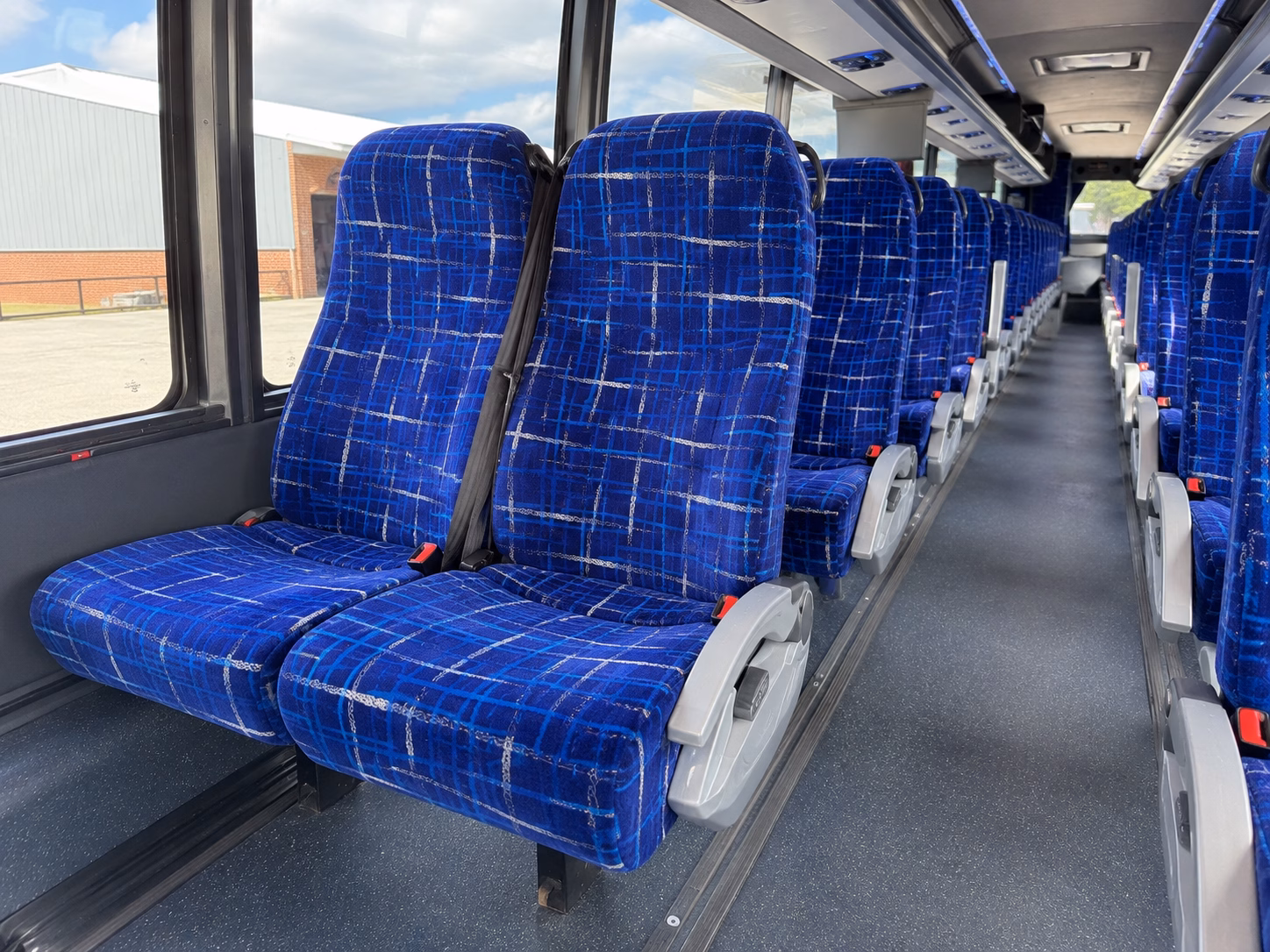how your starting location and deadhead miles affect charter bus rates in ann arbor michigan